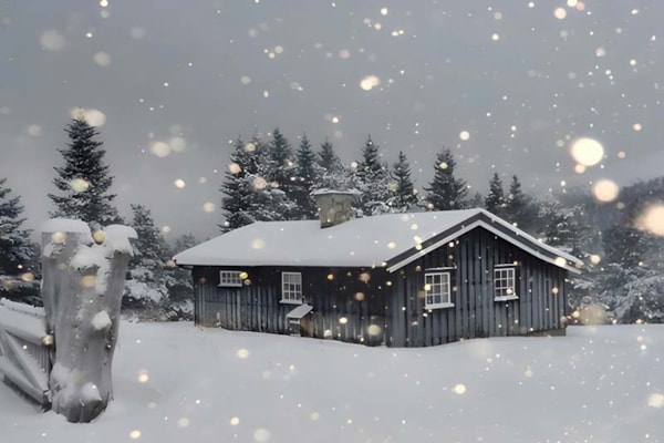 Hytte i snøvær
