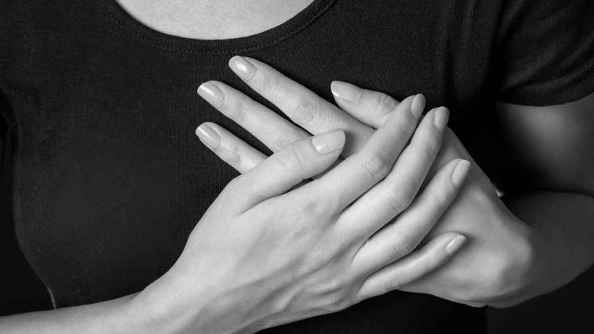 Kvinne med smerter i hjertet