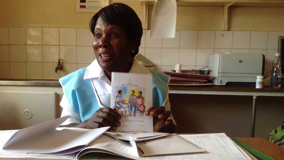 photo of nurse showing brochures