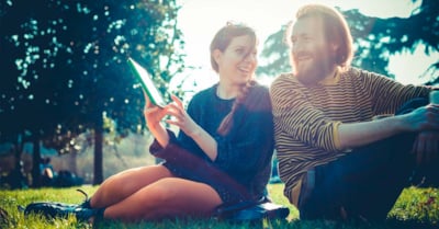 Couple in a park, in the sun